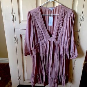 New never been worn mini dress.Color is a dusty lavender